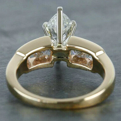 "Marquise w Solitaire Cut Sidestones"