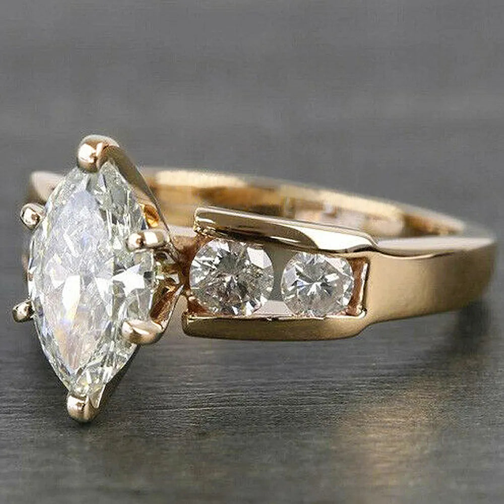 "Marquise w Solitaire Cut Sidestones"